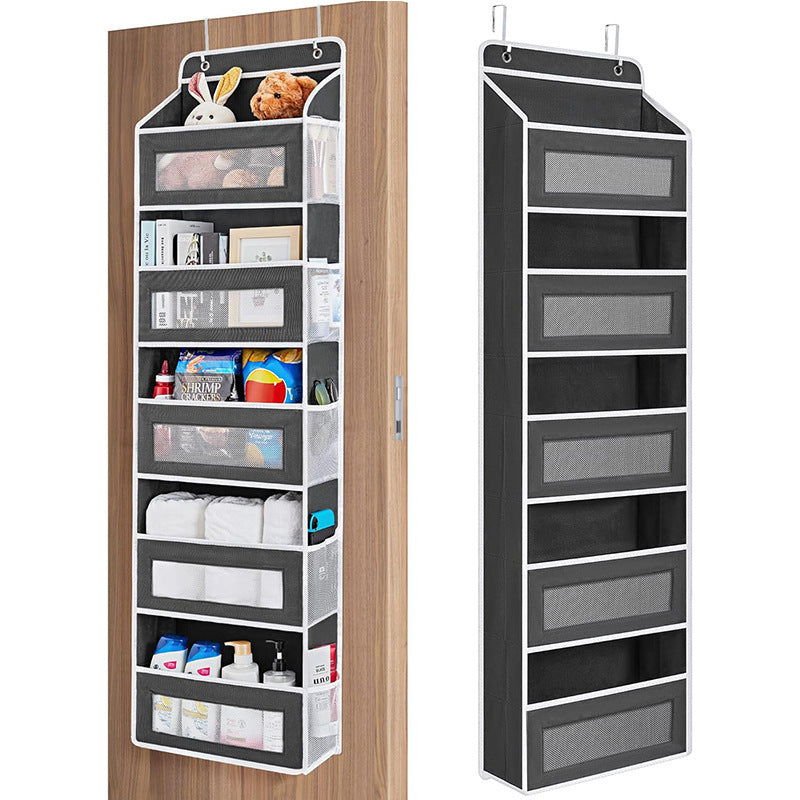 Black hanging organizer with multiple shelves against a wooden door and white background