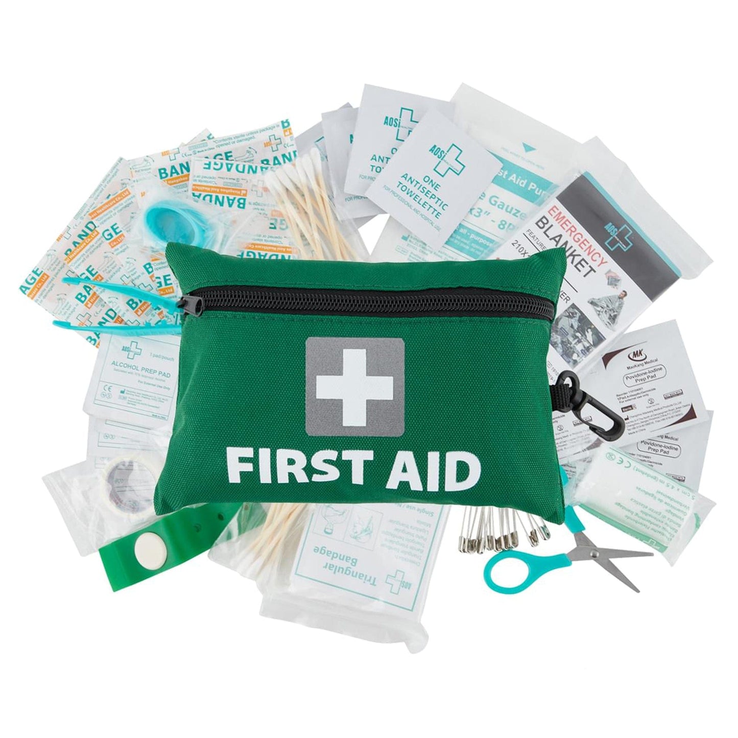 A green first aid kit with a white cross logo, opened to display its contents including bandages, antiseptic wipes, and a pair of scissors.