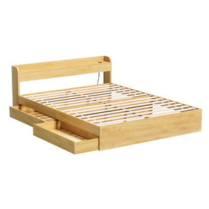 Wooden bed frame with storage drawers on a white background