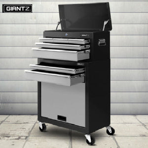 A Giantz 7-drawer tool trolley in black and grey with multiple closed drawers, a lock on the front, and set on castor wheels for mobility.
