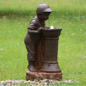 Boy at Water Fountain