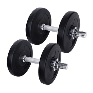 A pair of dumbbells with black weight plates and silver handles.