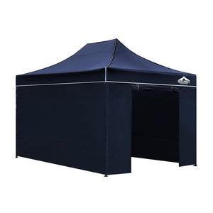Gazebo Pop Up Marquee 3x4.5m Folding-Navy

Constructed with PU-coated Oxford fabric, this INSTAHUT 3x4.5 m Pop Up Gazebo offers reliable UV and water protection. Measuring 300 x 450cm, it is ideal for various outdoor events and provides both shade and shelter. The sturdy steel frame, featuring strong legs and support struts, can be easily assembled and is built to last.