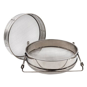 A stainless steel double-layer honey sieve with a fine mesh inner screen and a coarser outer screen, featuring a handle for holding.