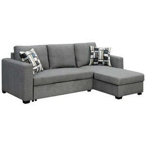 A modern gray sectional sofa with a pull-out bed mechanism and a chaise lounge with storage ottoman, accompanied by two decorative pillows.