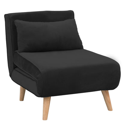 A black faux velvet adjustable corner sofa chair with a solid wood frame and a cushion on a leg, designed to convert into a bed.